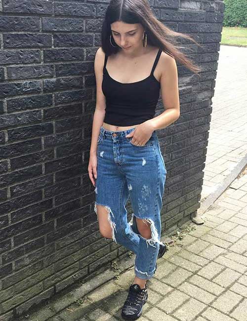 Distressed Boyfriend Jeans With A Tank Top