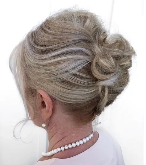 Curly French Roll Updo Mother of the Bride Hairstyles