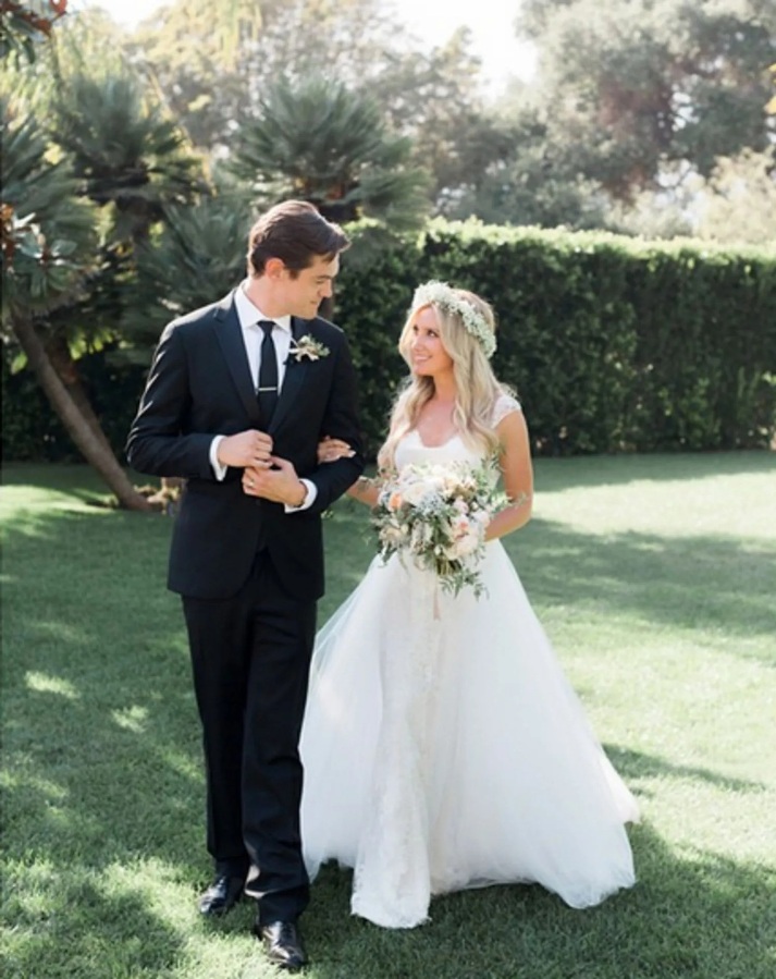 Ashley Tisdale beautiful lace gown with an off-the-shoulder neckline and a flowing skirt