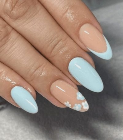 baby blue base with a single floral accent nail