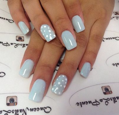 baby blue nail with a geometric dots