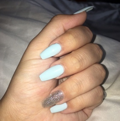 baby blue nail with a single accent nail