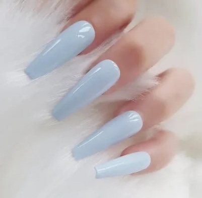 solid baby blue nail color with a glossy finish