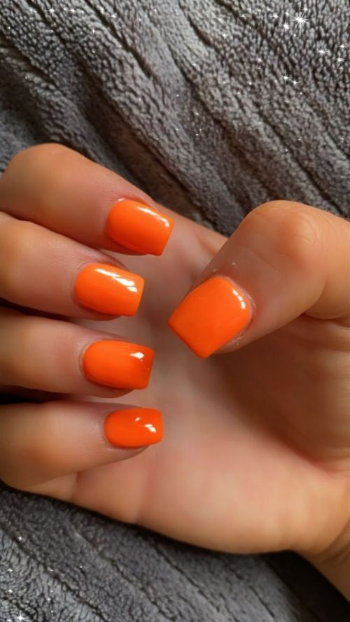 solid orange manicure